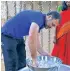  ??  ?? Rahul having the biriyani (L); preparing the raitha