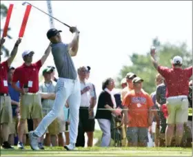  ?? JOHN WOIKE — HARTFORD COURANT VIA AP ?? Jordan Spieth watches his tee shot on the 11th hole during the first round of the Travelers Championsh­ip at TPC River Highlands on Thursday in Cromwell, Conn.