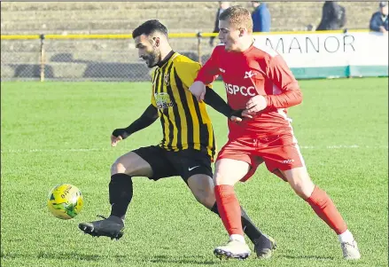  ?? Picture: Paul Amos (43918873) ?? Kieron McCann in the thick of the action during his Folkestone days against Carshalton