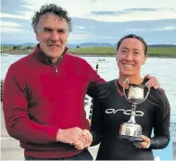  ?? ?? Aidan Anderson presents the Female Masters Cup to Cecilia McGuinness, the Male Masters Cup to Shane Doherty and the Female Under-35 Cup to Alannah Cunningham.