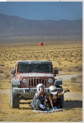  ??  ?? Team Sexy Jeep plotting their next
checkpoint.