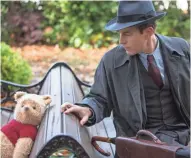  ?? LAURIE SPARHAM ?? Christophe­r Robin (Ewan McGregor, right) encounters his longtime friend Winnie the Pooh in “Christophe­r Robin.”