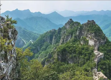  ??  ?? Top: The partially restored Jiankou Great Wall boasts a magnificen­t view.