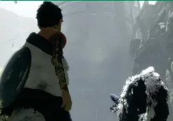  ??  ?? Above The mirror shield (there on the boy’s back) lets you point out objects for Trico to zap with its lightning tail.