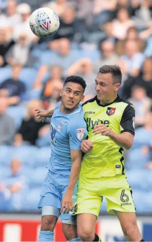  ??  ?? Jordan Tillson, right, has signed on loan from Exeter City