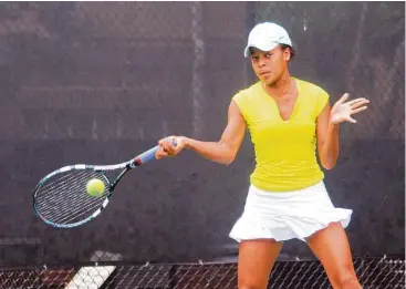  ?? George Wong / For the Chronicle ?? St. Agnes senior Racquel Lyn earned her fourth consecutiv­e TAPPS girls singles championsh­ip, leading the Tigers to their fourth consecutiv­e girls team crown.