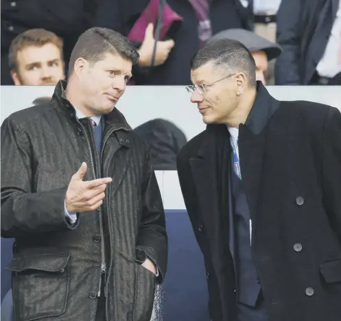  ??  ?? 0 Dominic Mckay, pictured with SPFL chief executive Neil Doncaster, will have a full intray when he takes over at Celtic