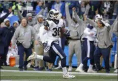  ?? THE ASSOCIATED PRESS FILE ?? Todd Gurley and the Los Angeles Rams look to stay undefeated when they head to Seattle to take on the Seahawks in a key NFC West showdown Sunday. Seattle has won two games in a row but is battling injuries.