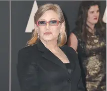  ?? VALERIE MACON/GETTY IMAGES/FILES ?? Carrie Fisher earned an Emmy nomination for a guest spot on 30 Rock in 2007.