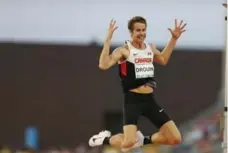  ?? STEVE RUSSELL/TORONTO STAR ?? Olympic medallist Derek Drouin almost matched his Canadian record in winning Pan Am high jump gold on Saturday night, clearing 2.37 metres.