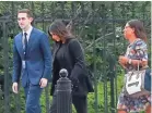  ??  ?? Kim Kardashian, center, arrives with her attorney Shawn Chapman Holley at the security entrance of the White House in Washington on Wednesday.