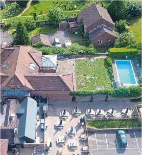  ??  ?? An aerial view of the party venue, a six-bedroom bungalow in Headley