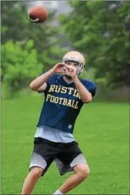  ?? MICHAEL REEVES — FOR DIGITAL FIRST MEDIA ?? Rustin receiver Tim Durant catches a pass during practice Tuesday night.