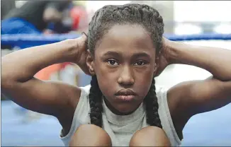  ?? Associated Press photos ?? This image released by Oscillosco­pe shows Royalty Hightower in a scene from “The Fits,” a film about an 11year-old girl who learns about gender and identity through dance.