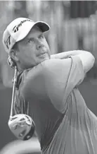  ?? CARLOS OSORIO/ASSOCIATED PRESS ?? Doug Barron drives on the first hole during the first round of the Buick Open at Warwick Hills Golf & Country Club in Grand Blanc, Mich., on Aug. 3, 2006.