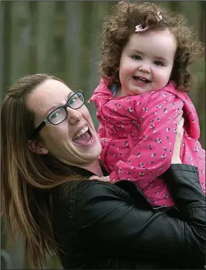  ??  ?? Picture of health: Angela Park with Jessica, who survived against the odds