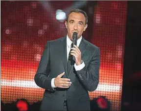  ??  ?? L’animateur franco-grec est aux commandes du show de NRJ depuis 2009.