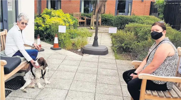  ??  ?? Family visits have started again at The Ashton care home in Hinckley, after the easing of the coronaviru­s lockdown. The care home says it strived to keep things ‘as normal as possible’ during the lockdown