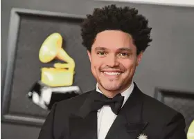  ?? Jordan Strauss / Associated Press ?? Trevor Noah is hosting the Grammy Awards for a third-straight year on Sunday.