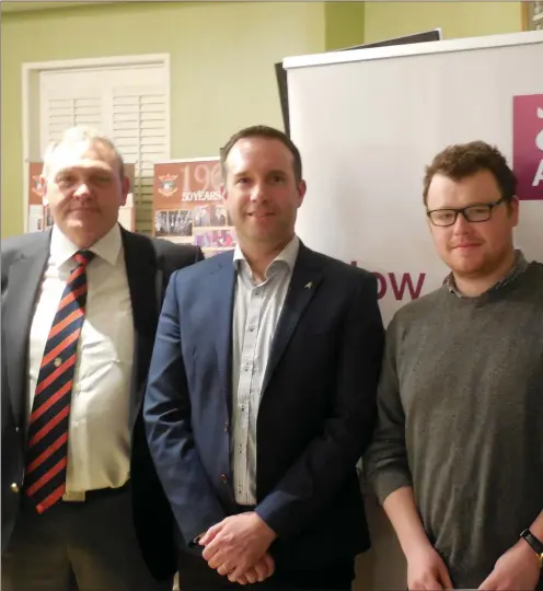  ??  ?? County Louth Club Captain Pat McCabe and Ronan Foley (Manager at AIB, sponsor) presenting the winners of the scotch foursomes competitio­n, Niall