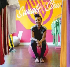  ?? ANTHONY VAZQUEZ/SUN-TIMES ?? Brittany Stewart poses inside her store, Sweats X Stew, at 5 East 83rd St.