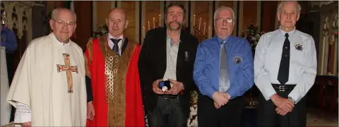  ??  ?? Medal recipient Tom Reck with Fr Michael O’Shea, Cllr Frank Staples, Mayor of Wexford; Padge Reck and Jack Higginboth­am, Friends of the Tall Ships.