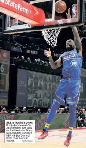  ?? Getty Images ?? ALL-STAR IS BORN: Knicks first-time All-Star Julius Randle puts up a shot at the rim for Team Durant during Sunday’s NBA All-Star Game at State Farm Arena in Atlanta.