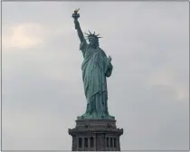  ?? KATHY WILLENS – THE ASSOCIATED PRESS ?? The Statue of Liberty portrays a beacon of freedom and hope.