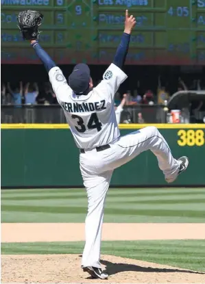  ?? OTTO GREULE JR / GETTY IMAGES ?? Felix Hernandez pitched the third perfect game of the year in a win against the Rays.
