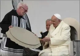  ?? GREGORIO BORGIA — THE ASSOCIATED PRESS ?? Pope Francis meets young people and elders at Nakasuk Elementary School Square in Iqaluit, Canada, on Friday. It was his final day in Canada.