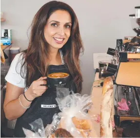  ??  ?? Helena's Espresso at Nerang has reopened. Owner Helena Jaffar with a selection of her food.