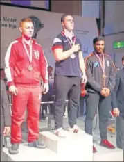  ??  ?? ▪ Akash Tyagi (third) poses with bronze medal on Sunday.