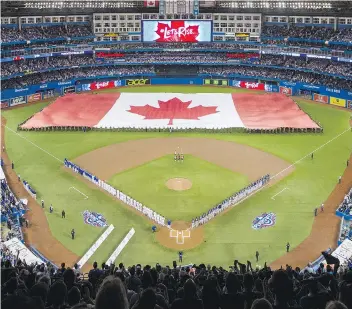  ?? CARLOS OSORIO/ POOL VIA GETTY IMAGES ?? The CRTC has ordered Rogers to offer its 4K content to Telus immediatel­y, after Telus asked the regulator to intervene so its clients with 4K TV sets could watch the Toronto Blue Jays’ home opener.