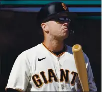  ?? JEFF CHIU — THE ASSOCIATED PRESS ?? Giants catcher Buster Posey, in his 12th big league season, batted .292 with two home runs through his first seven games this year.