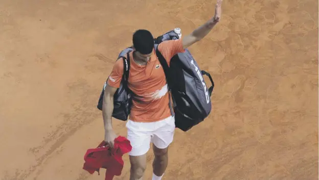  ?? ?? Serbia’s Novak Djokovic waves as he leaves the court after losing against Spain’s Alejandro Davidovich Fokina at the Monte-carlo ATP Masters yesterday