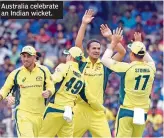  ??  ?? Australia celebrate an Indian wicket.