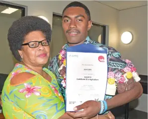  ?? Photo: Ronald Kumar ?? Australian Pacific Training Coalition (APTC) Certificat­e II in Agricultur­e graduate Josefa Bota with mum, Lanieta Laukato at FNU Nasinu Campus on May 17, 2023.