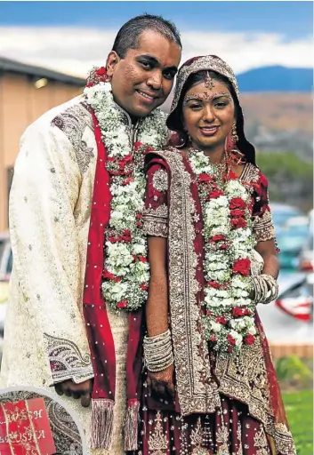  ??  ?? GLITTERATI: Pravesh and Jerusha look like a million dollars in their complement­ary wedding outfits