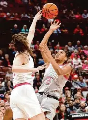  ?? Jay LaPrete/Associated Press ?? Indiana forward Mackenzie Holmes blocks a shot during the Hoosiers’ win over Ohio State.