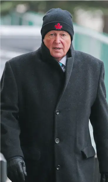  ?? GAVIN YOUNG / POSTMEDIA NEWS ?? Former judge Robin Camp walks into a hearing Tuesday at the Law Society of Alberta offices in Calgary where he is asking for reinstatem­ent as a lawyer.