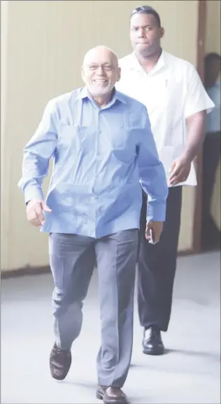  ??  ?? Former President Donald Ramotar (left) at court yesterday