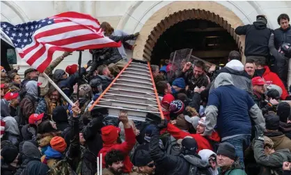  ?? Photograph: Lev Radin/Pacific Press/REX/Shuttersto­ck ?? Pro-Trump rioters storm the Capitol on 6 January.