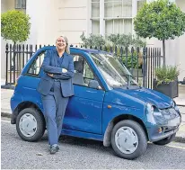 ?? ?? Lisa Markwell with the Citroën Ami in central London, main pictures and, below, with the ‘rollerboot’ GWiz she has driven for more than 15 years