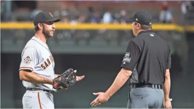  ?? PATRICK BREEN/THE REPUBLIC ?? Madison Bumgarner played a big role in three World Series championsh­ips for the Giants, but his pitching dominance has declined over the past few seasons.