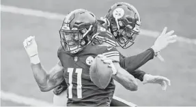  ?? KEITH SRAKOCIC/AP ?? Steelers wide receiver Chase Claypool (11) celebrates with tight end Eric Ebron after one of his three TD catches Sunday against the Eagles.