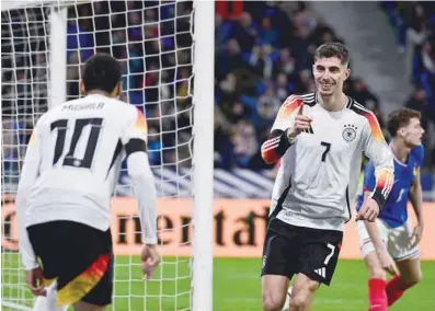  ?? — AFP ?? Kai Havertz (R) celebrates after scoring Germany’s second goal.