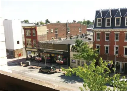  ?? EVAN BRANDT — MEDIANEWS GROUP ?? A view of the south side of the 200 block of High Street and the former VanBuskirk building, right, from the third floor of the former Ellis Mills department store.