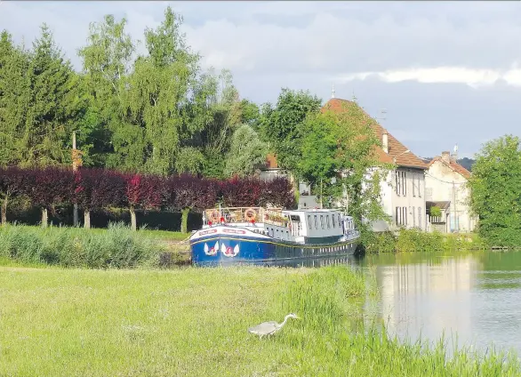  ?? PHOTOS: MIKE GRENBY ?? Riding the hotel barge La Belle Epoque through the Burgundy Canal meant a relaxed pace punctuated by historical sites, country markets and gourmet meals.