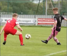  ??  ?? James Esser plays the ball beyond Cork’s Shane O’Riordan.