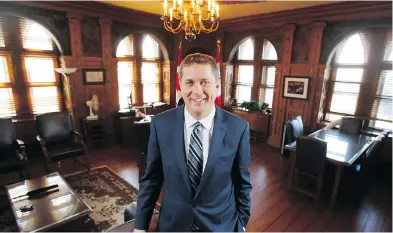  ?? PATRICK DOYLE / THE CANADIAN PRESS ?? Conservati­ve Party leader Andrew Scheer, in his office on Parliament Hill last week, seems comfortabl­e sharing the spotlight with more voluble colleagues, writes columnist John Ivison.